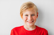 © Studio Firma/Stocksy - Cute Blond Boy Looking at Camera
