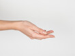 © Laura San Segundo/Stocksy - Female hand on empty white background