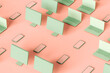 © Giada Canu/Stocksy - pattern of Laptop, pc, and phones on pink background