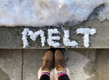 The Word Melt Written In Snow