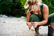 © Victor Bordera/Stocksy - woman preparing for fishing