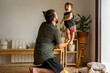 © Eloisa Ramos/Stocksy - Funny family father enjoying his fatherhood at home