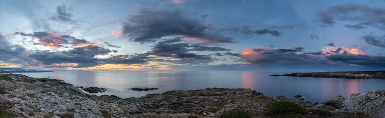 Wall Mural - Evolution of the storm on the Cantabrian coast until the spectacular multicolored sunset!