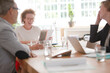 © KOTO - Office workers having meeting at desk