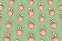 Pattern Of Pink Skulls And Bone On Green Background
