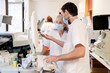 © Santi Nuñez/Stocksy - Medical Workers Using Lab Equipment