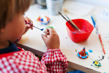 Kid Painting At Home