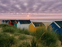 Sunrise Over Brightly Coloured Beach Huts