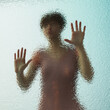 © Don Smith/Stocksy - Reflection series: woman trapped
