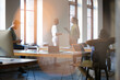 © KOTO - Casual business people working in open office