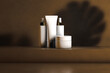 © Marcos Osorio/Stocksy - Still life of cosmetic pot on brown background