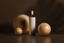 Still Life Of Cosmetic Pot On Brown Background