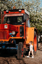 Boy Exploring Agronomy Tractor