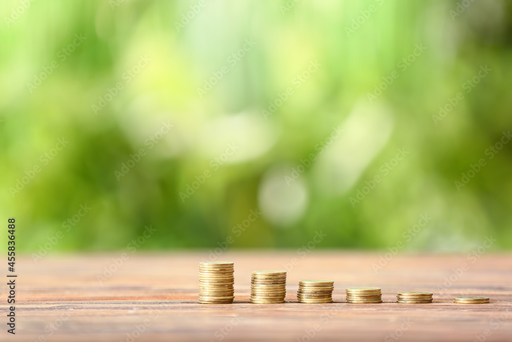 Coins on table outdoors. Concept of debt