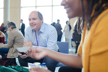 People playing cards during conference break