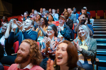 Wall Mural - Smiling, excited audience cheering