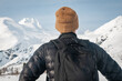 Man Peering Toward Mountains in Alaska 