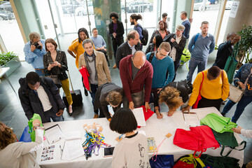 Canvas Print - People signing up for conference