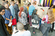 © KOTO - People signing up for conference