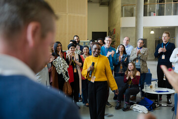 Canvas Print - Audience listening to female speaker