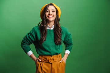 Young brunette woman laughing and looking at camera