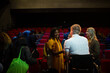 © KOTO - Speaker in wheelchair talking to conference audience