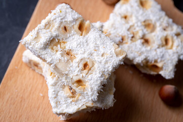 Wall Mural - Traditional delicious Turkish dessert; cezerye with hazelnuts and coconut (Turkish name; Findikli madonna)