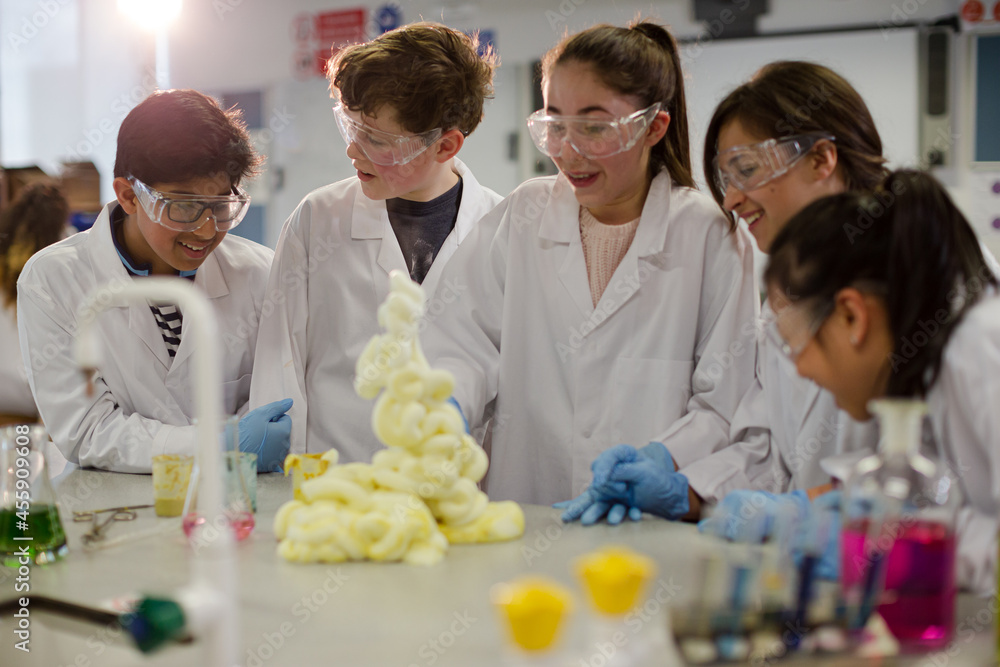 Person Exploding Science Experiment Surprised students conducting exploding foam scientific experiment in ...