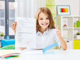 Wall Mural - education and school concept - happy smiling student girl with school test and A grade showing thumbs up over home room background