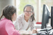 © KOTO - Girl students working at computer in library
