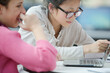 © KOTO - Girl students using laptop in library