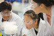 © KOTO - Surprised, curious students watching chemical reaction, conducting scientific experiment in laboratory classroom