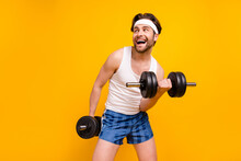Portrait Of Attractive Cheerful Guy Lifting Weight Working Out Active Hobby Isolated Over Bright Yellow Color Background