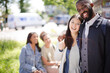 © KOTO - Portrait smiling, affectionate young couple hugging in sunny park
