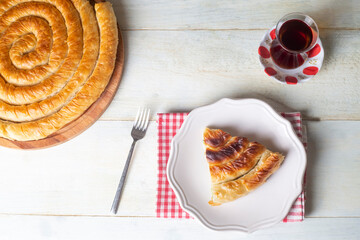 Wall Mural - Turkish Tepsi Boregi, Round Borek, Tray pastry (Turkish name; rulo borek)