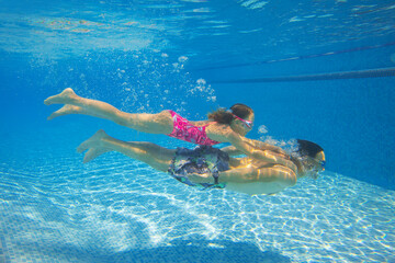 family  in swimming pool