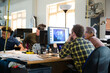 © KOTO - Colleagues working together at computer