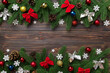 © sosiukin - Christmas background with fir branches and Christmas decor. Top view, copy space for text