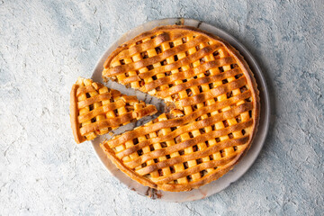 Wall Mural - Homemade apple pie with red and green apples around