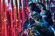© ADDICTIVE STOCK - Cool black model in futuristic glasses with glitter ball