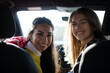 © KOTO - Portrait happy, playful young women in car