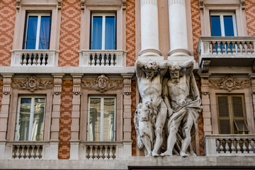 Wall Mural - Italy. Liguria. Genoa. Caryatids of a facade of a palace