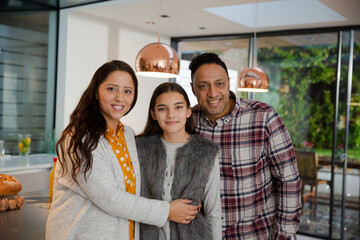 Wall Mural - Portrait happy family in kitchen