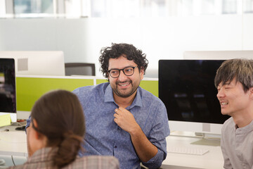 Wall Mural - Business people talking in open plan office