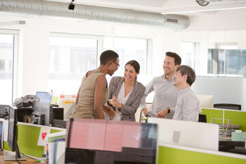 Wall Mural - Business people talking in open plan office