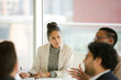 © KOTO - Businesswoman leading conference room meeting
