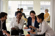 © KOTO - Enthusiastic business people working together in relax zone