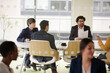 © KOTO - Enthusiastic business people working together in relax zone