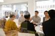 © KOTO - Business people enjoying sushi lunch