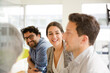 © KOTO - Business people enjoying sushi lunch in conference room
